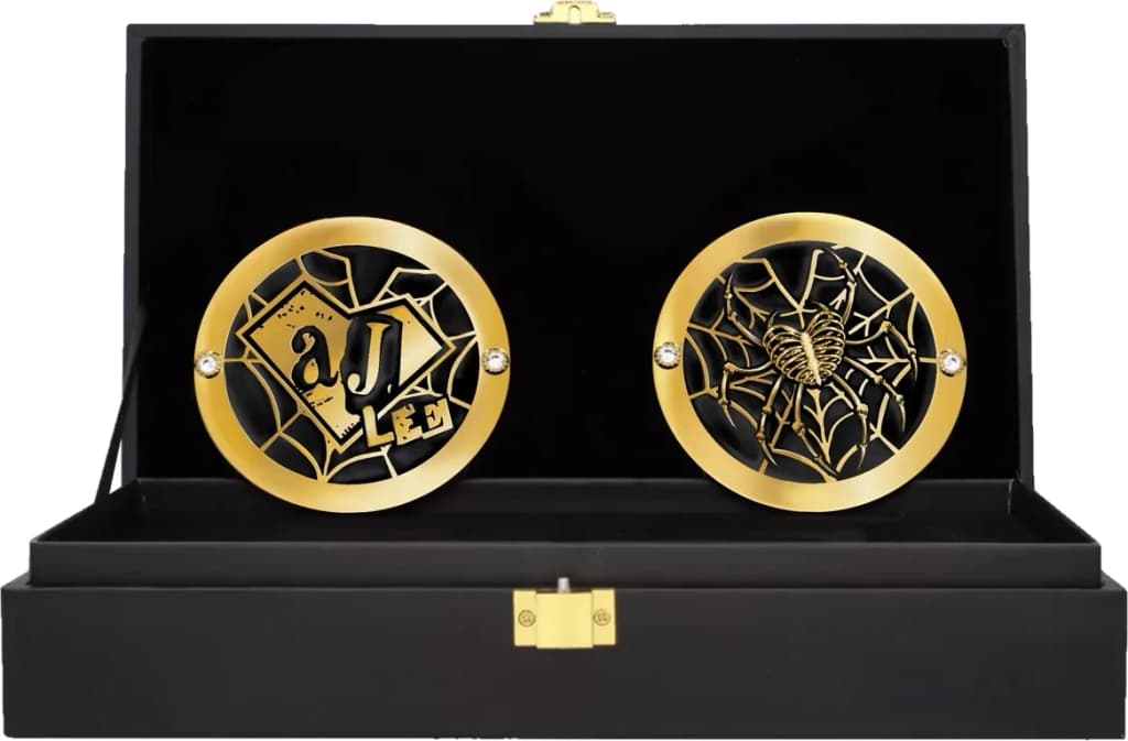 Display-grade side plate set with die-struck metal plates on a full-grain leather strap.