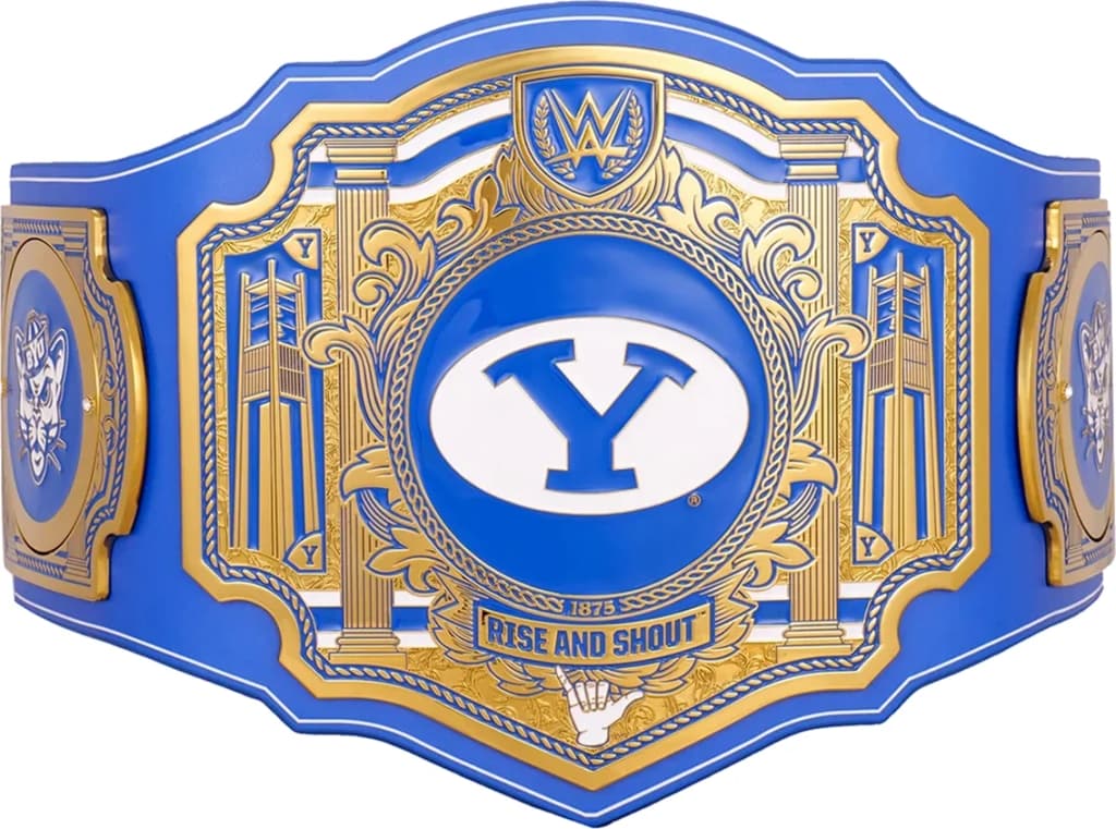 Display-grade replica championship title belt with die-struck metal plates on a full-grain leather strap.