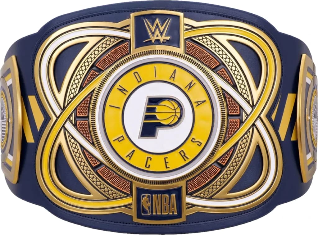 Display-grade replica championship title belt with die-struck metal plates on a full-grain leather strap.