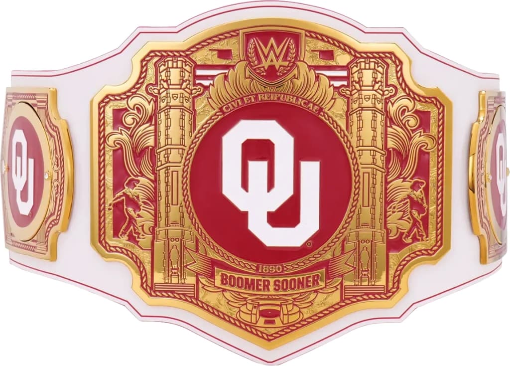 Display-grade replica championship title belt with die-struck metal plates on a full-grain leather strap.