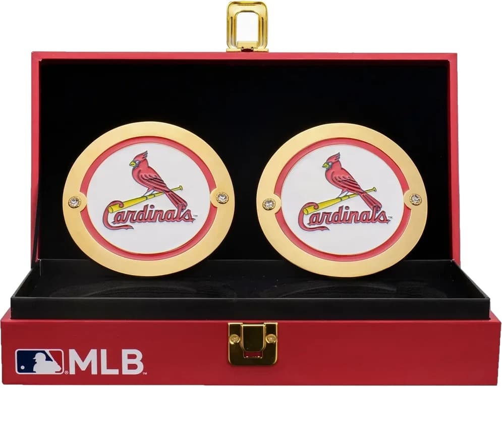 Display-grade side plate set with die-struck metal plates on a full-grain leather strap.